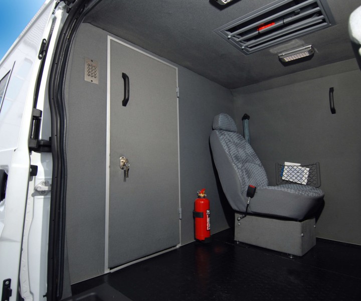 inside the armored car to transport money